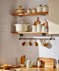 Rock Solid Hidden Floating Shelf Brackets Heavy Duty Black Metal L Bracket Wall Support in modern kitchen with shelves.