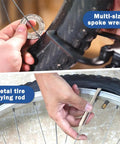 Person using Eight Piece Bike Spoke Wrench Tool Kit For Rim Truing And Tire Levers With Storage Box on bicycle wheel