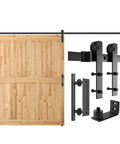 All In One Heavy Duty Sliding Barn Door Hardware Kit Features 11 Foot Track With Whisper Quiet Nylon Rollers For Rock Solid Reliability Smooth Silent Operation Dead Simple Install Durable Alloy Frame No Door Included Matte Black Finish with wooden door panel.