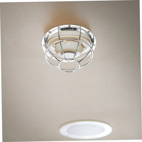 Built Tough Four Piece Fire Sprinkler Head Guards Featuring Hella Secure Tamper Proof Mesh Shields Impact Resistant Sensor Caps For Home Safety And Quick Snap Install Hooks mounted on ceiling.