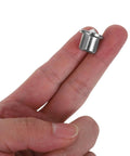 Hand holding a metal piece from the 8 Piece Dowel Center Pin Set With Precision Point For Woodworking Drilling And Hole Alignment