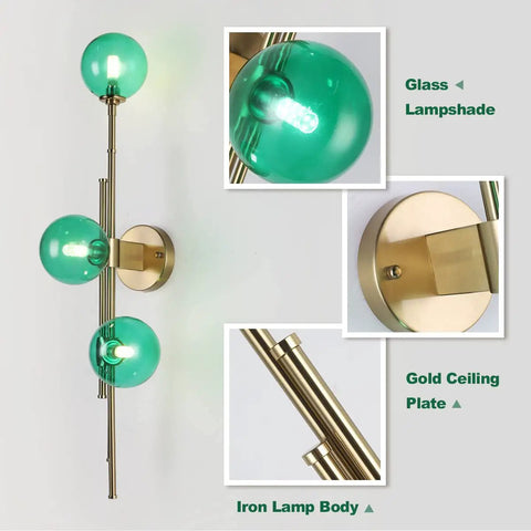 Dope Gold Long Strip 3 Light Globe Vanity Wall Sconce With Green Glass Shades Minimalist Mirror Bathroom Lighting close-up