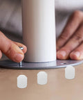 DIY assembly using 150 Pcs Plastic Dowel Inserts for Cabinet Doors with white hinge dowels on a surface