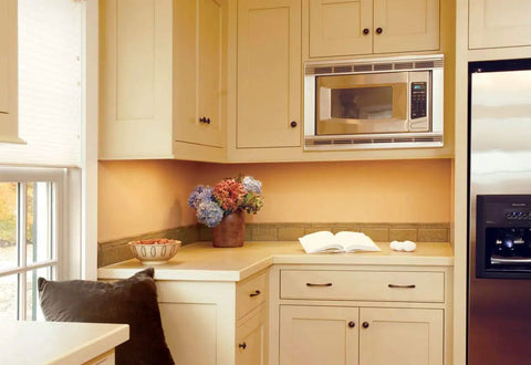 Kitchen with beige cabinets, featuring the Unfinished One And One Quarter Inch Cabinet Knob In Everyday Heritage Style Go To Drawer Knob