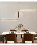 Modern Minimalist Three-Stage Creative Pendant Light Dining Table Indoor Living Room Bar Golden/Black LED Light (Colour: BlackDimmable Size: L100-W10-H150) (Blackwarmlight L120) above a stylish dining table.