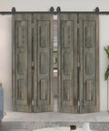 56 In By 84 In Three Panel Shaker Hollow Core Weather Gray Pine Wood Double Bi Fold Door With Sliding Barn Door Hardware Kit And 63 In Track Includes Two 28 In By 84 In Doors Durable Finger Joint Pine Warp Resistant For Indoor Closets And Room Dividers front view installed in living room