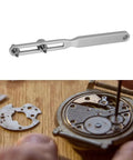 Adjustable Watch Back Remover Tool with Wrench Style Case Back Opener Kit and watch mechanism in repair process