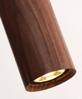 Close-up of Top Shelf Real Walnut Ceiling Pendant Light, showcasing solid walnut body and warm light for modern dining spaces.