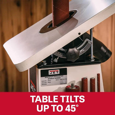 Benchtop Oscillating Spindle Sander With One Half Horsepower 115 Volt Single Phase Precision Ball Bearing Spindle Support shown tilted