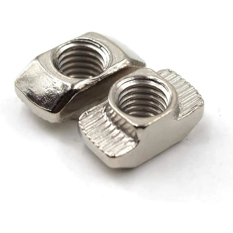 Close-up of Premium 50 Pack M6 Thread T Slot Nuts Hammer Head Fastener for Aluminum Framing, nickel plated carbon steel.