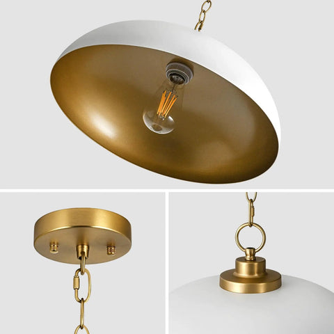 Close-up of Top Shelf Matte White Farmhouse Pendant Light With Burnished Brass Accents, showing adjustable chain and bulb.