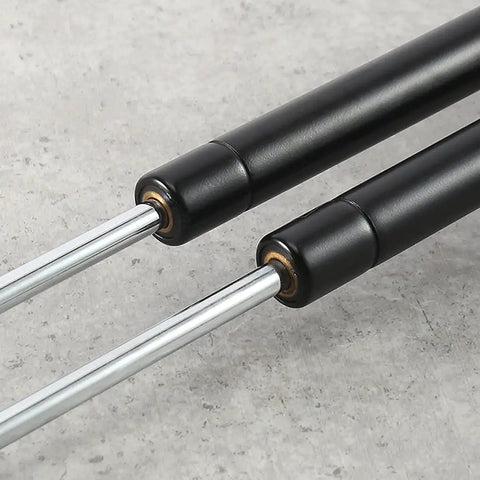 Close-up of Gas Spring Cabinet Door Hinge for Kitchen Cabinets with Hydraulic Soft Close Support and Durable Furniture Hardware