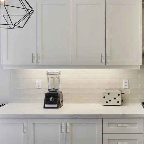 White kitchen cabinets with Brushed Satin Nickel Cabinet Knobs 10 Pack, 2 Inch Solid Zinc Alloy T Bar Cupboard Drawer Pulls, single hole mount.