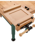 Heavy Duty Solid Oak Workbench With Bulletproof Steel Legs And Dual Vise Setup Featuring smooth drawers and removable dock.
