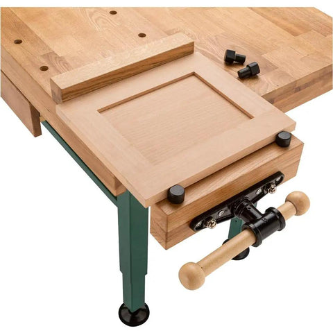 Heavy Duty Solid Oak Workbench With Bulletproof Steel Legs And Dual Vise Setup Featuring smooth drawers and removable dock.