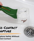 5x Magnifying Bug Catcher With One-Handed Quick Release Trap For Indoor Outdoor Exploration Kids And Adults STEM Learning Toy For Safe Bug Viewing And Easy Release, green plastic, clear lens, holding scorpion over sink