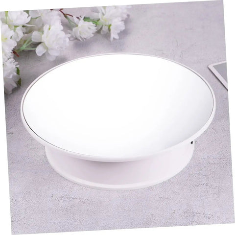 MiniKEYA Electric Rotating Display Stand USB Powered Turntable with sturdy base and mirrored surface, 7.9-inch diameter.