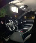 Toyota Tundra interior with 6000K White LED Interior Light Kit for 2007-2021, illuminating map lights and dashboard