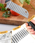 Stainless steel onion slicer crinkle cutter with ergonomic black grip; includes two onion holder slicers