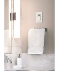P82W Sensaire Humidity Sensing Bathroom Exhaust Fan Control Wall Switch White installed in bathroom above towel rack