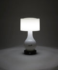Six LED Battery Operated Motion Sensing Table Lamp With Dual Zone Lighting for body, shade, or both, on dark surface