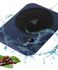 Smart Desk Mug Warmer With Three Adjustable Heat Modes And Built In Safety Timer For Auto Shut Off on a wet surface with coffee beans.