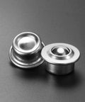 Two stainless steel ball transfer bearings showing smooth surface and rounded design for easy glide in DIY projects.