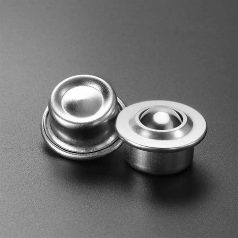 Two stainless steel ball transfer bearings showing smooth surface and rounded design for easy glide in DIY projects.