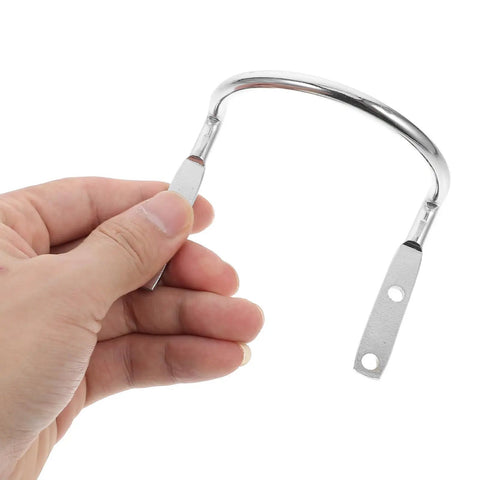 Close-up of a hand holding a hook from the Heavy Duty Hammer Holder Wall Mount Tool Rack With Iron Hooks, 4 Pack, Garage And Workshop Organization.