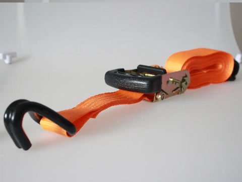 Close-up of an orange strap from 1.5 In X 15 Ft Padded Ratchet Tie Down Straps Set, 3000 Lbs Break Strength, 1000 Lbs Working Load, Hook