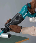 Person using 18V Cordless Reciprocating Saw Tool Only With Variable Speed Trigger And Tool Free Blade Change For Fast Blade Swaps Easy One Hand Use LXT Compatible Great For Demolition Remodeling And Quick Cuts Blue on metal pipe.