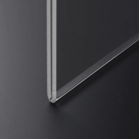 Close-up of clear acrylic wall mount sign holder 8.5 by 11 inches horizontal showing material thickness and corner detail