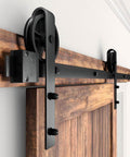 Heavy Duty Boss Grade Black Barn Door Hardware Kit For Wood Sliding Doors Five To Sixteen Feet Flat Track System installed