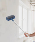Extendable Paint Roller Kit With Adjustable Pole For Ceiling Painting Featuring Ergonomic Grip Heavy Duty Construction shown in use on a wall.