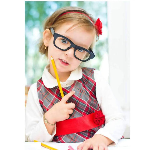 Girl wearing glasses and a plaid dress with a red belt, holding a pencil and wearing a Gold Heart Initial Bracelet For Girls A To Z Stainless Steel Jewelry Perfect Birthday Gift For Kids Ages 6 And Up Cute Flower Girl Accessory For Everyday Wear And Special Occasions.