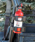 Tailgate Tested Polaris RZR Fire Extinguisher Kit With Slick Quick Release Mount And Ul Rated Point Five Pound Canister mounted on RZR.
