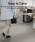 Person carrying the Plug And Play Heavy Lifter Four Bay Sata Storage Enclosure For 2.5 And 3.5 Inch Drives with Chill Operating Fan.