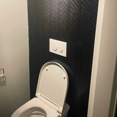 Black Herringbone Peel And Stick Kitchen Backsplash Tiles Kit Covering 14.64 Sq Ft Aluminum Composite Panels behind toilet