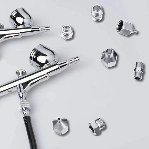 Seven Piece Airbrush Adapter Kit With Multi Size Fittings Including 1/8 In, 1/4 In And M5 BSP Threads shown with metal couplings