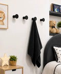 Top Shelf Four Pack Slick Black Round Wall Hooks For Hanging Towels Coats And Hats Modern Minimalist Entryway Decor Rock Solid Home Organization Upgrade with towel