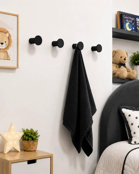 Top Shelf Four Pack Slick Black Round Wall Hooks For Hanging Towels Coats And Hats Modern Minimalist Entryway Decor Rock Solid Home Organization Upgrade with towel