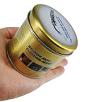 Hand holding tin of Anti-Spatter Welding Gel for MIG Nozzles, Keeps Nozzle Clean and Spatter-Free, Easy Apply Barrier
