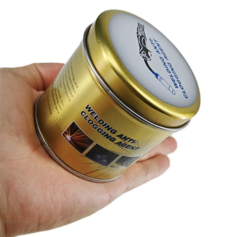 Hand holding tin of Anti-Spatter Welding Gel for MIG Nozzles, Keeps Nozzle Clean and Spatter-Free, Easy Apply Barrier