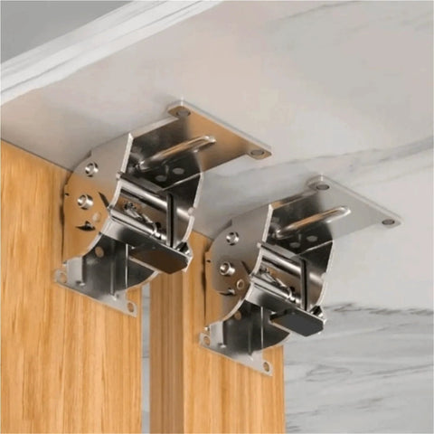 Side view of two zinc-plated 180-degree folding table hinge assemblies mounted under a table with screws.