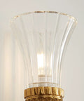 Close-up of the clear glass shade of top grade solid copper wall sconce light fixture for bedroom hallway and living room.