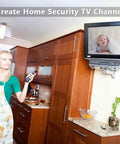 Woman in kitchen using RF Modulator For AV To Coax Output With Channel 3 4 Switch, baby on TV, CCTV concept in home setting.