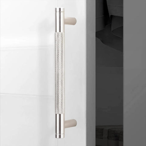 10 Pack 5 Inch Center To Center Brushed Satin Nickel Knurled Cabinet Handles installed on white cabinet door