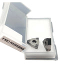 High-Precision Lathe Tool Inserts WNMG080404 CBN-6 And WNMG080408 CBN-6 in a storage box, showing geometric shape and double-edged design.