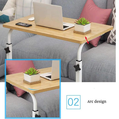 Multi Function Adjustable Height Laptop Desk Featuring Slick Rolling Casters And Sturdy Steel Build Prime Bedside Serving Tray for couch with laptop and plant.
