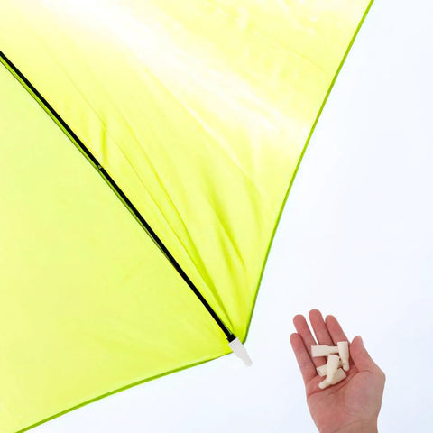 Cool DIY Fixers For Your Dinged Umbrellas: 10 Pc Plastic Stick End Caps With Snap Holes Ribs Bone Tips For Weathering Daily Commute And Shading In Style. beige plastic umbrella rib tip in hand